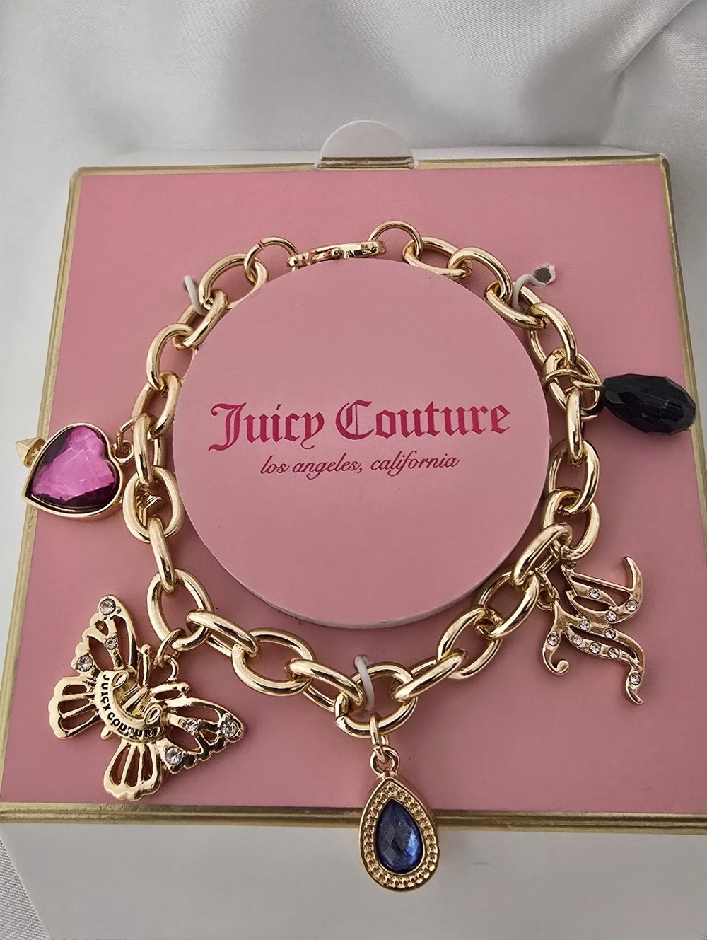 Juicy Couture Gold Charm Bracelet with Blue , Purple & Buttterfly Charms